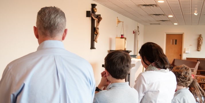 M praying as a family